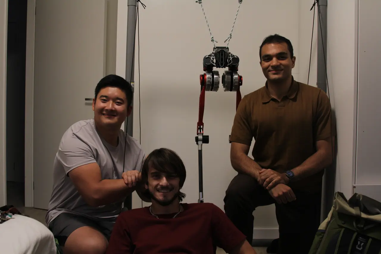 The osstrich team with the robot